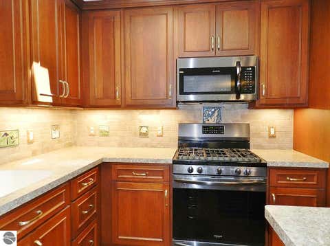 Tiny photo for 12055 S Woodwinds Circle #23, Traverse City, MI 49684 (MLS # 1946905)