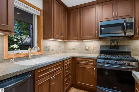 Tiny photo for 12055 S Woodwinds Circle #23, Traverse City, MI 49684 (MLS # 1946905)