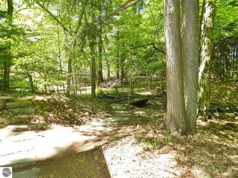 Tiny photo for 12055 S Woodwinds Circle #23, Traverse City, MI 49684 (MLS # 1946905)