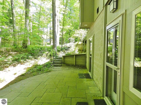 Tiny photo for 12055 S Woodwinds Circle #23, Traverse City, MI 49684 (MLS # 1946905)