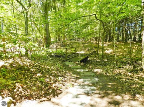 Tiny photo for 12055 S Woodwinds Circle #23, Traverse City, MI 49684 (MLS # 1946905)