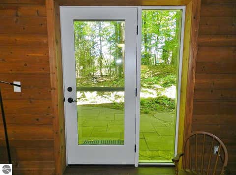 Tiny photo for 12055 S Woodwinds Circle #23, Traverse City, MI 49684 (MLS # 1946905)