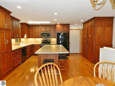 Tiny photo for 12055 S Woodwinds Circle #23, Traverse City, MI 49684 (MLS # 1946905)