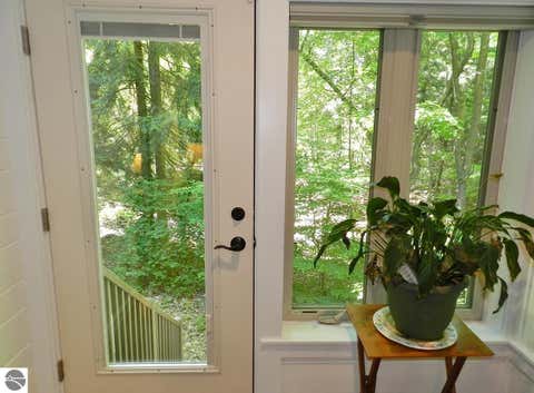 Tiny photo for 12055 S Woodwinds Circle #23, Traverse City, MI 49684 (MLS # 1946905)