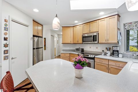 Tiny photo for 12055 S Woodwinds Circle #28, Traverse City, MI 49684 (MLS # 1944970)