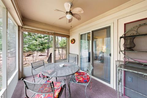 Tiny photo for 12055 S Woodwinds Circle #28, Traverse City, MI 49684 (MLS # 1944970)