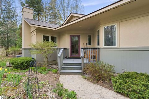 Photo of 12055 S Woodwinds Circle #28, Traverse City, MI 49684 (MLS # 1944970)