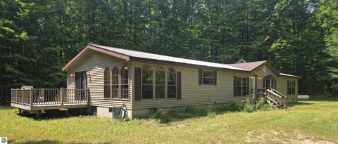 Photo of 8494 Starvation Lake Road, Mancelona, MI 49659 (MLS # 1948703)