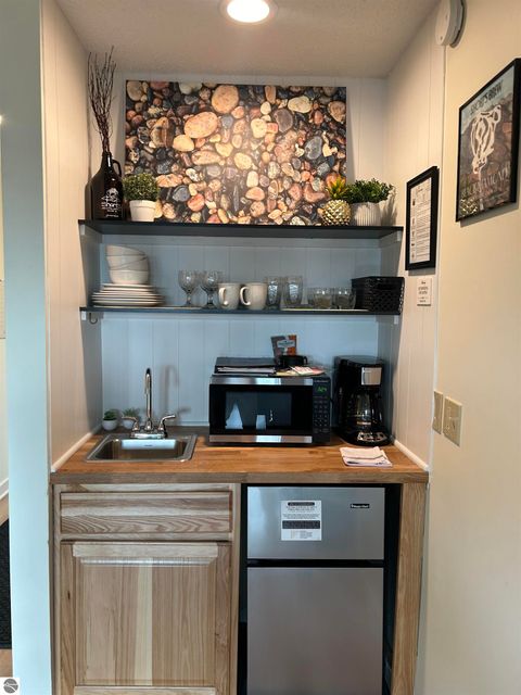 Tiny photo for 4673 N Crossover Drive, Bellaire, MI 49615 (MLS # 1943134)