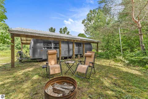 Tiny photo for 8594 W Old State Road, Central Lake, MI 49622 (MLS # 1948999)