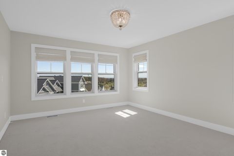 Tiny photo for 91 Vineyard Ridge Drive #13, Traverse City, MI 49686 (MLS # 1945277)