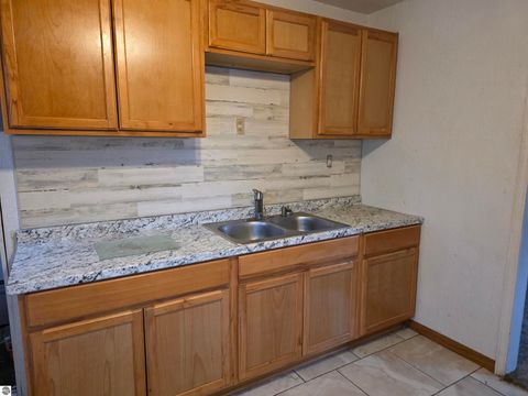 Tiny photo for 130 Smith Street, Oscoda, MI 48750 (MLS # 1941572)