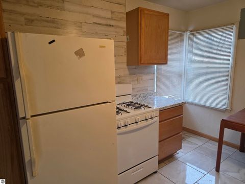 Tiny photo for 130 Smith Street, Oscoda, MI 48750 (MLS # 1941572)