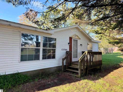 Photo of 13764 Winters Road, Kewadin, MI 49648 (MLS # 1945467)