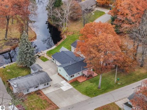 Tiny photo for 224 W Lake Drive, Cadillac, MI 49601 (MLS # 1941131)