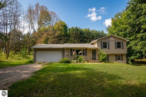 Photo of 6594 Summit City Road, Kingsley, MI 49649 (MLS # 1950396)