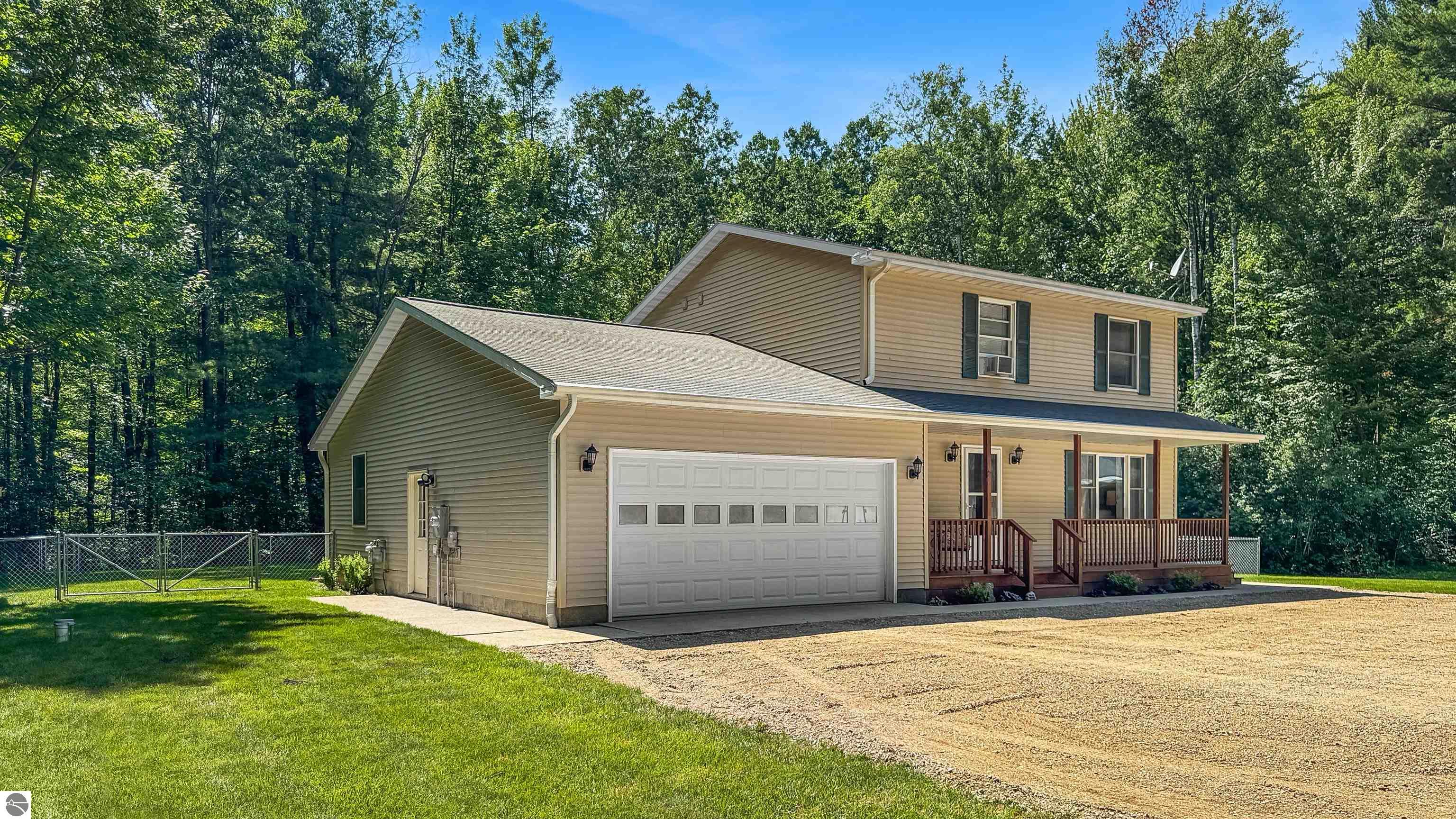 Photo 1 of 58 — 402 Indiana Avenue, Cadillac, MI 49601