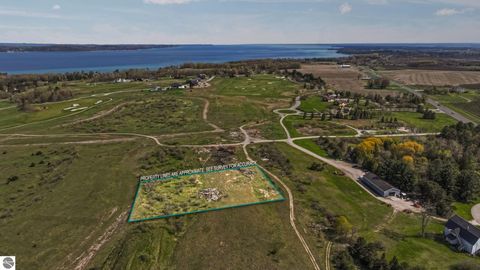 Photo of 7549 Highgrove Trl, Williamsburg, MI 49690 (MLS # 1945304)
