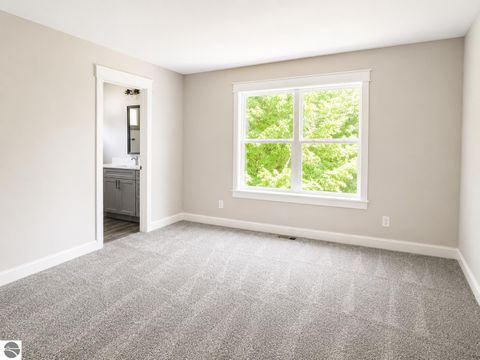 Tiny photo for 3080 Winchester Drive #18, Traverse City, MI 49686 (MLS # 1945740)