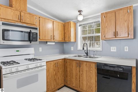 Tiny photo for 7710 East Street, Interlochen, MI 49643 (MLS # 1942665)