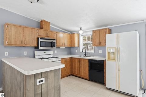 Tiny photo for 7710 East Street, Interlochen, MI 49643 (MLS # 1942665)