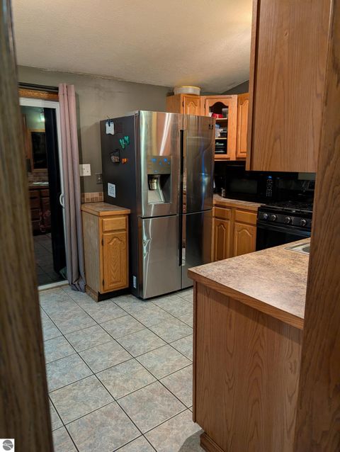 Tiny photo for 817 Walnut Street, Cadillac, MI 49601 (MLS # 1945177)