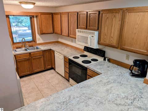 Tiny photo for 6865 Pinebrook Drive #11, Bellaire, MI 49615 (MLS # 1945662)