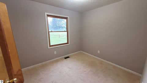 Tiny photo for 3962 Holiday RD, Traverse City, MI 49686 (MLS # 1947484)