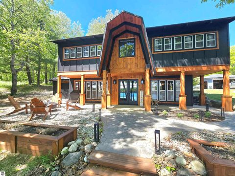 Photo of 10172 NE Carmichael Drive, Mancelona, MI 49659 (MLS # 1946165)