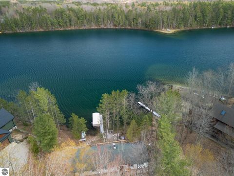 Photo of 10846 Bluff Drive, Mancelona, MI 49659 (MLS # 1945382)