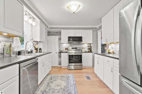 Tiny photo for 225 E River Street, Cadillac, MI 49601 (MLS # 1946871)