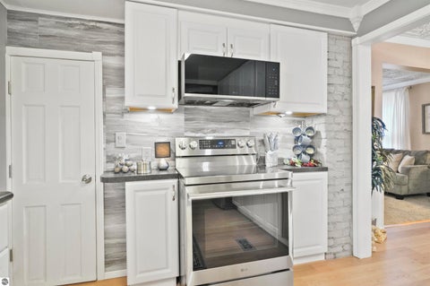 Tiny photo for 225 E River Street, Cadillac, MI 49601 (MLS # 1946871)