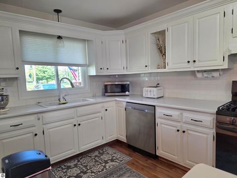 Tiny photo for 910 Smith Street, East Tawas, MI 48730 (MLS # 1945243)