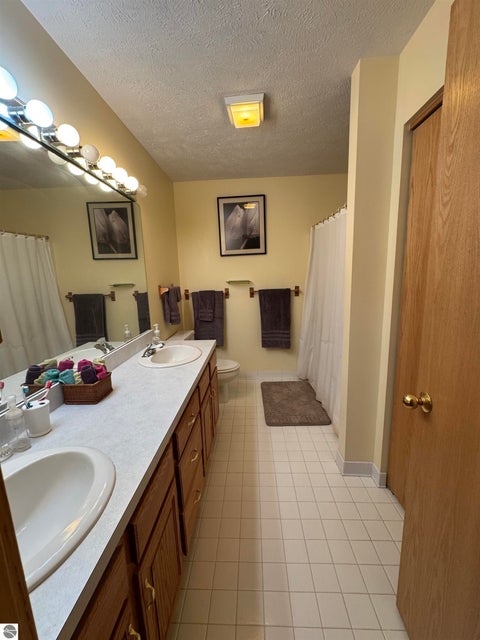 Tiny photo for 723 N Apple Tree Drive #18, Suttons Bay, MI 49682 (MLS # 1947202)