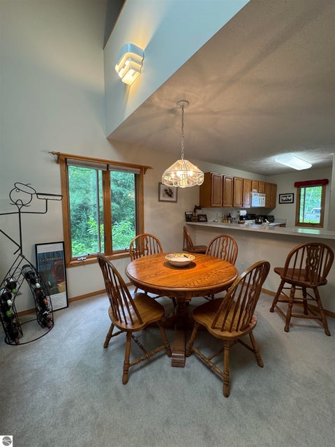 Tiny photo for 723 N Apple Tree Drive #18, Suttons Bay, MI 49682 (MLS # 1947202)