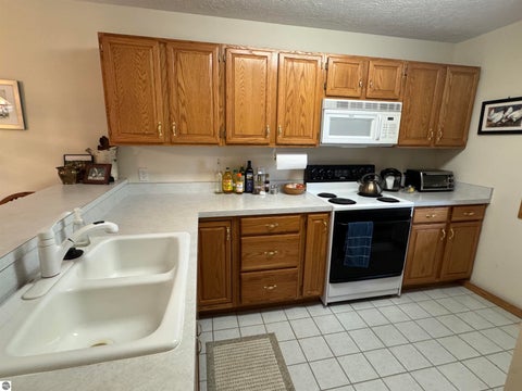 Tiny photo for 723 N Apple Tree Drive #18, Suttons Bay, MI 49682 (MLS # 1947202)