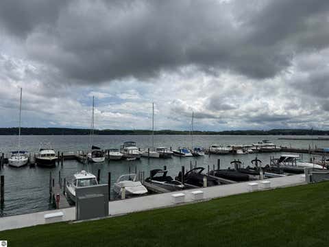 Tiny photo for 723 N Apple Tree Drive #18, Suttons Bay, MI 49682 (MLS # 1947202)