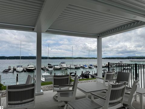 Tiny photo for 723 N Apple Tree Drive #18, Suttons Bay, MI 49682 (MLS # 1947202)
