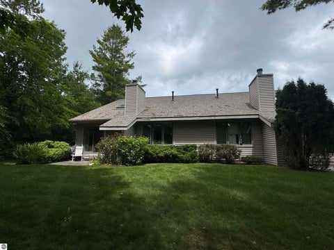 Tiny photo for 723 N Apple Tree Drive #18, Suttons Bay, MI 49682 (MLS # 1947202)
