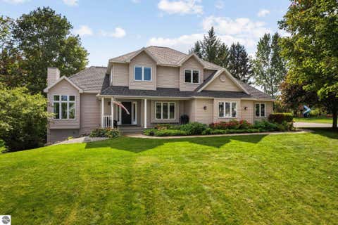 Photo of 4869 Westchester Commons, Traverse City, MI 49684 (MLS # 1944929)