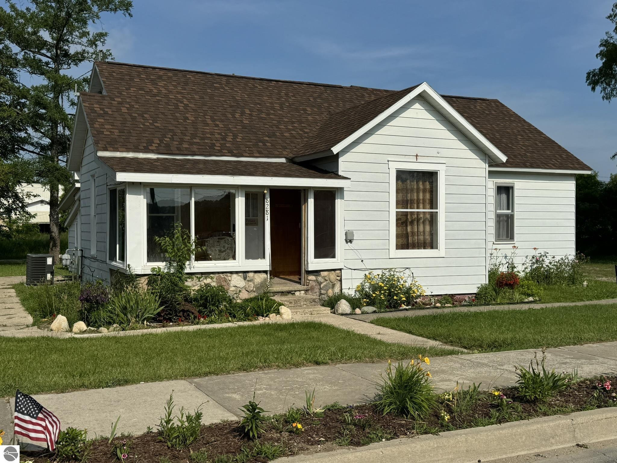 Photo 1 of 33 — 8281 Rapid City Road, Rapid City, MI 49676