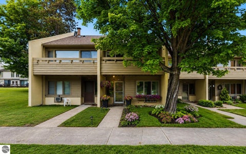 Tiny photo for 5000 Townhouse Drive #J8, Cedar, MI 49621 (MLS # 1946933)