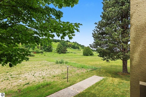 Tiny photo for 5000 Townhouse Drive #J8, Cedar, MI 49621 (MLS # 1946933)