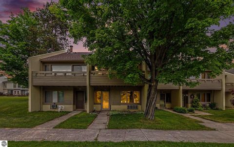 Photo of 5000 Townhouse Drive #J8, Cedar, MI 49621 (MLS # 1946933)