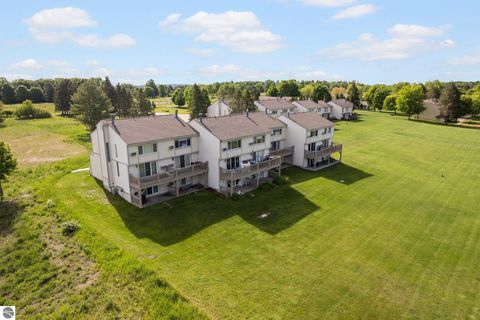Photo of 5000 Townhouse Drive #A3, Cedar, MI 49621 (MLS # 1945472)