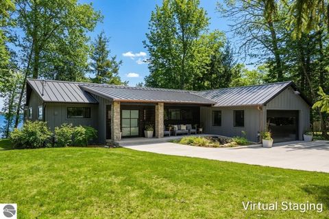 Photo of 1059 S Nanagosa TRL, Suttons Bay, MI 49682 (MLS # 1944668)