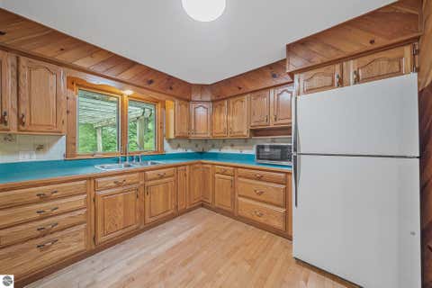 Tiny photo for 6586 Betsie River Road, Interlochen, MI 49643 (MLS # 1948362)