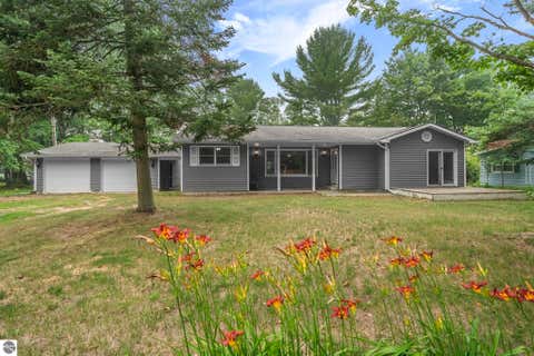 Photo of 6586 Betsie River Road, Interlochen, MI 49643 (MLS # 1948362)