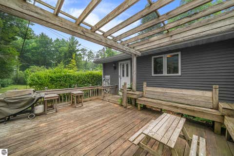 Tiny photo for 6586 Betsie River Road, Interlochen, MI 49643 (MLS # 1948362)