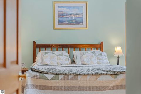 Tiny photo for 9871 E Woodcrest Court #20 & 21, Suttons Bay, MI 49682 (MLS # 1942990)